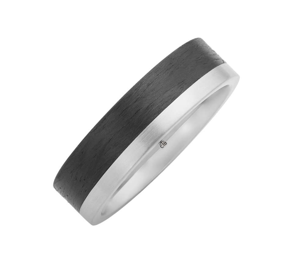 This is a picture of a Christian Bauer wedding band Carbon and platinum